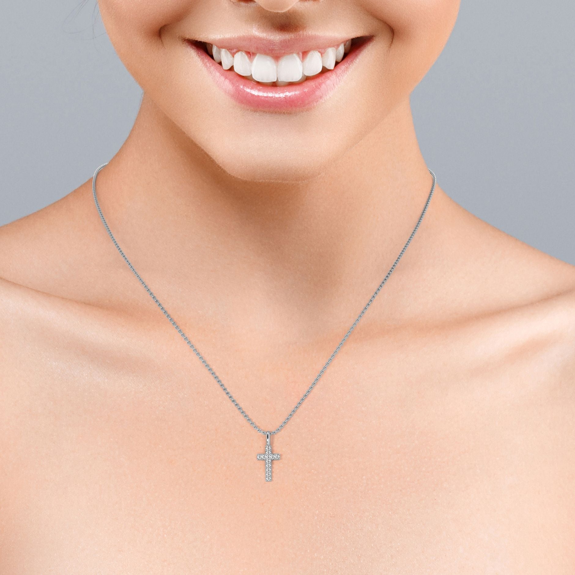 Minimalist 0.15 TCW Round Shaped Moissanite Crucifix Pendant Necklace with Pave Accents in 18K White Gold Plating over Silver