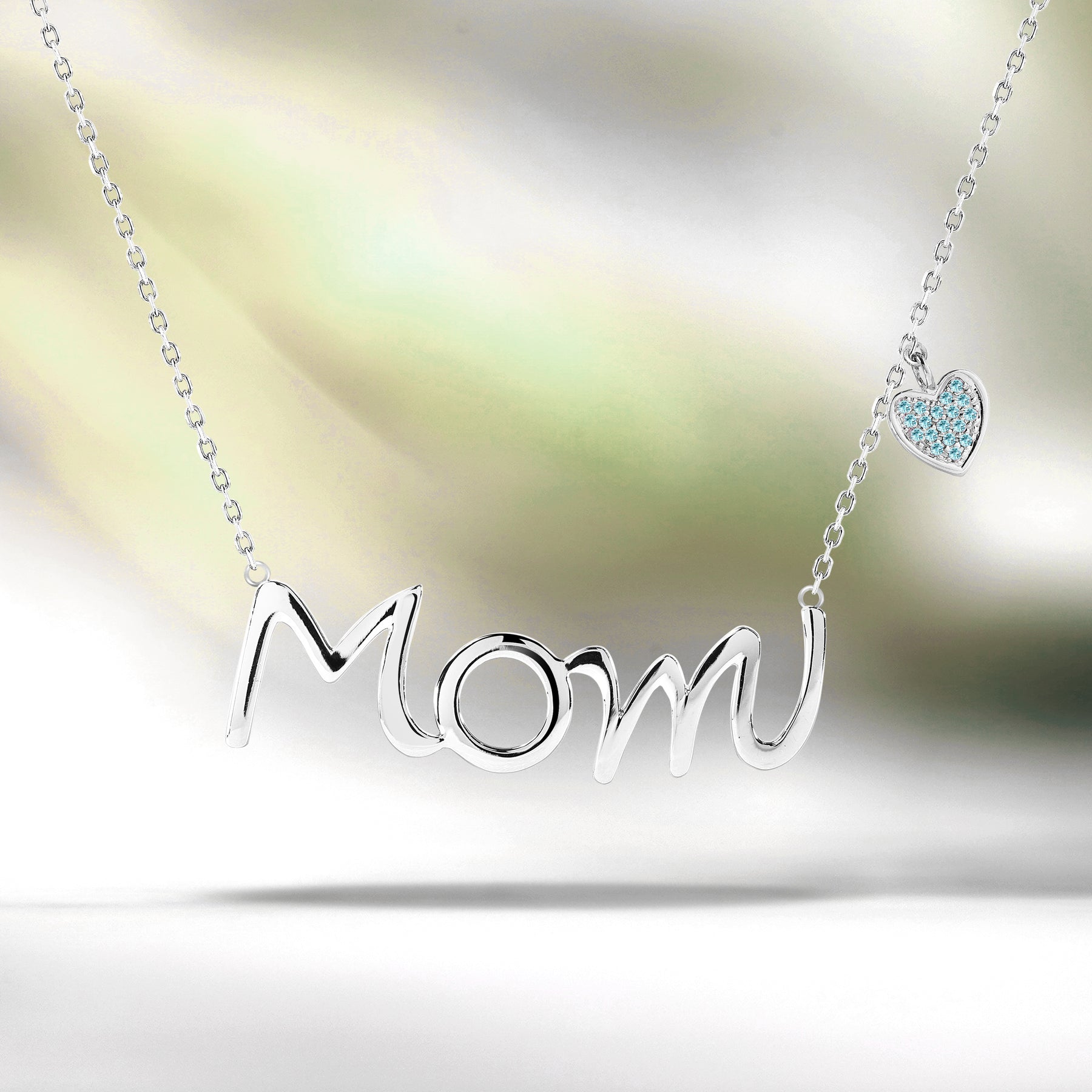 Mom Script Pendant with Light Blue Stone Decorated Heart Charm Pendant Necklace in 18K White Gold over Silver - December Birthstone