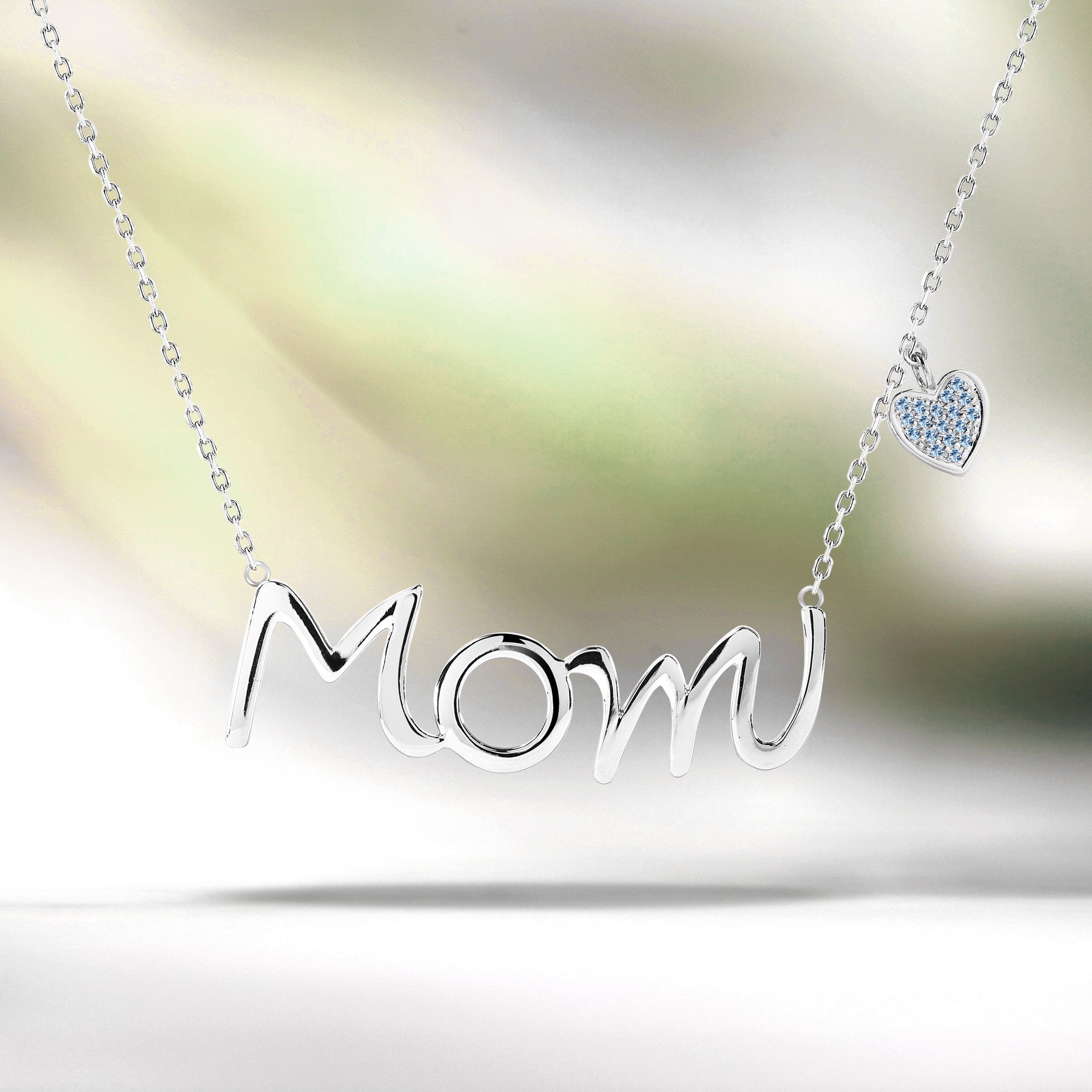 Mom Script Pendant with Ice Blue Stone Decorated Heart Charm Pendant Necklace in 18K White Gold over Silver - March Birthstone