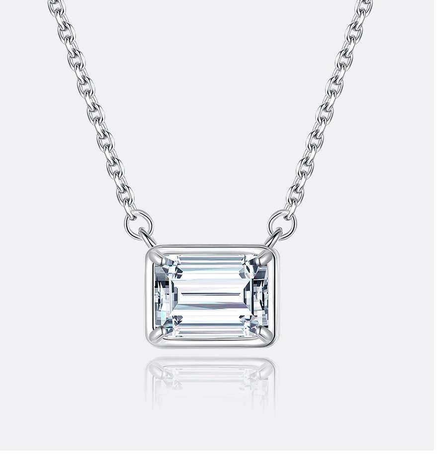 1 Carat Emerald Cut East-West Bezel Moissanite Pendant Necklace in 18K White Gold over Silver