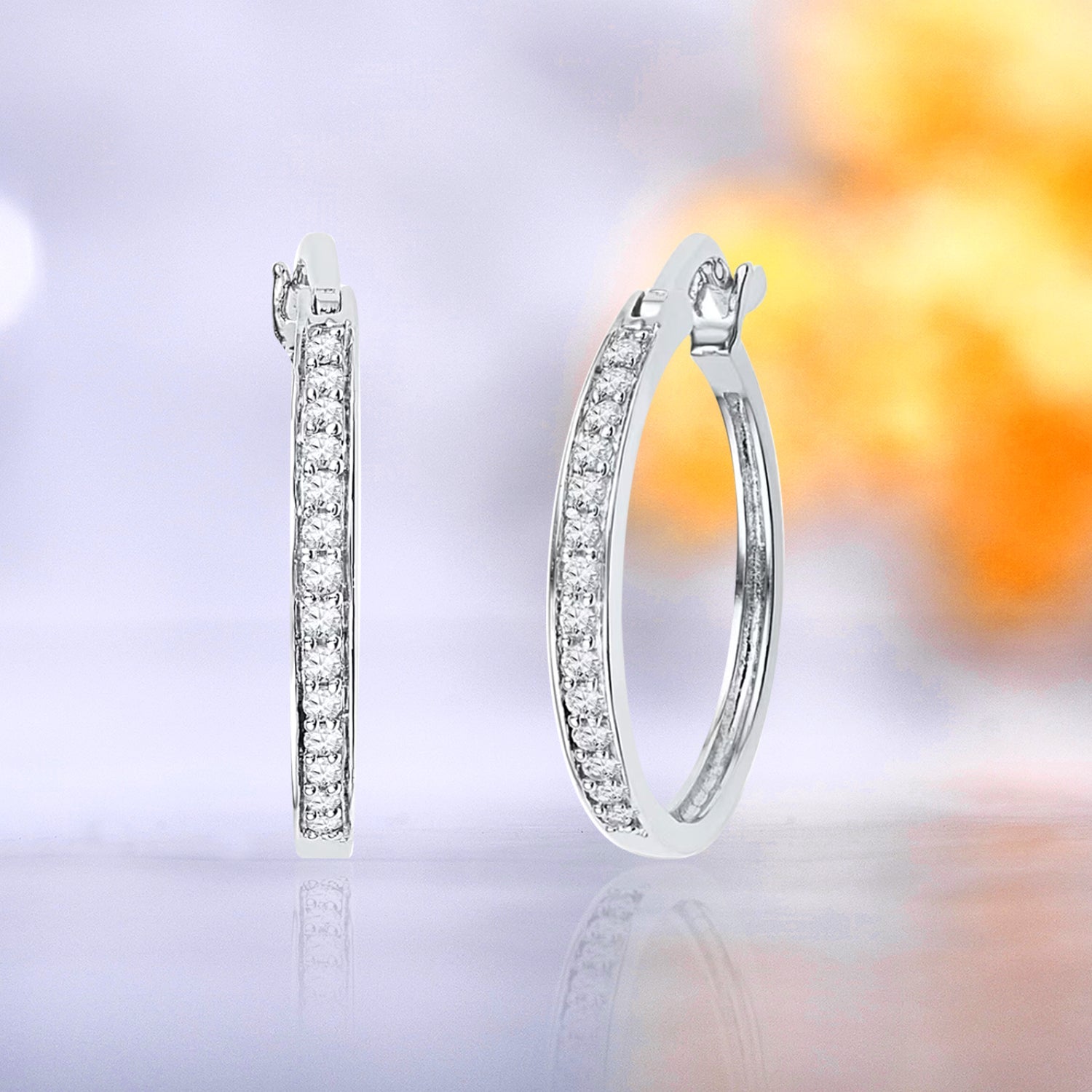 1 Carat Pave Set Thin Moissanite Huggie Earrings in 18K White Gold over Silver