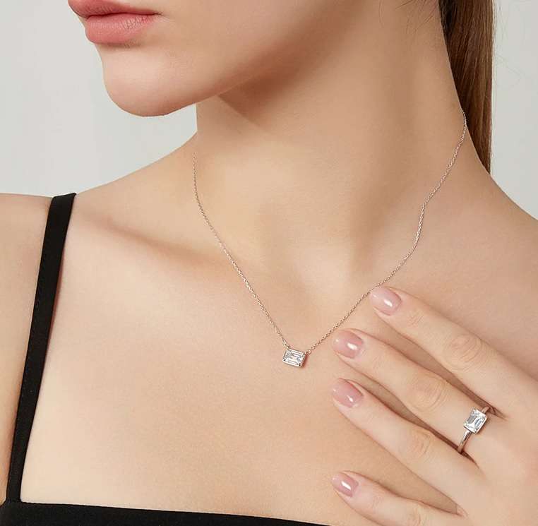 1 Carat Emerald Cut East-West Bezel Moissanite Pendant Necklace in 18K White Gold over Silver