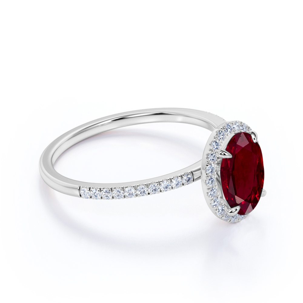 Antique 1.25 Carat Oval Cut Lab-Created Ruby and Diamond Halo Engagement Ring in Rose Gold