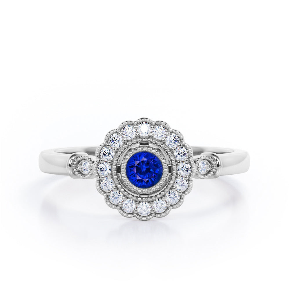 Milgrain Flower Halo 1.2 carat Carat Round Brilliant Cut Blue Sapphire and diamond Trilogy Bezel Engagement Ring in White Gold